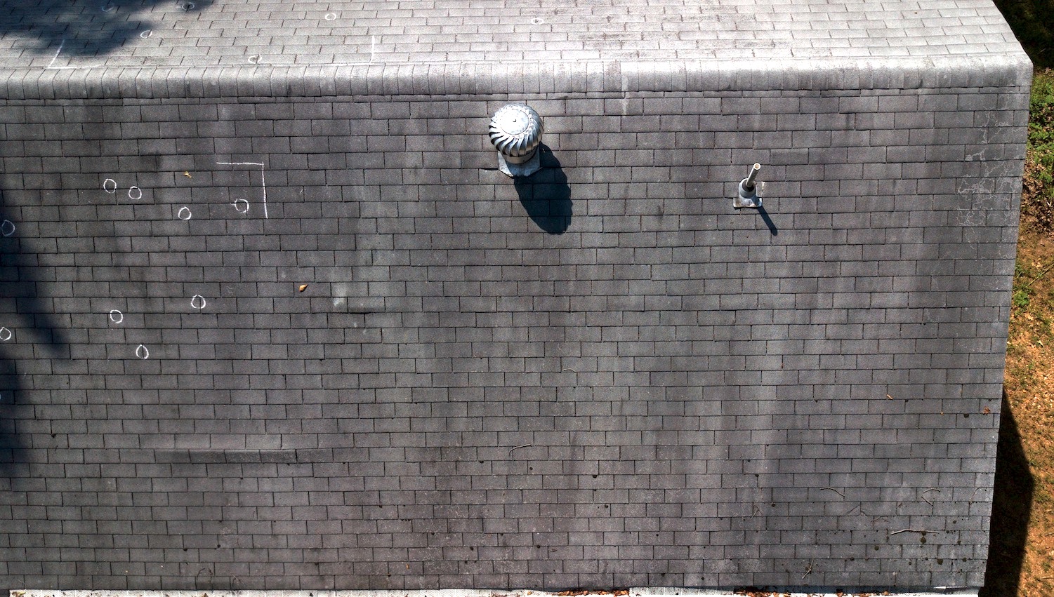 Umbrellas on Rooftop Patio of Vintage Brick Building