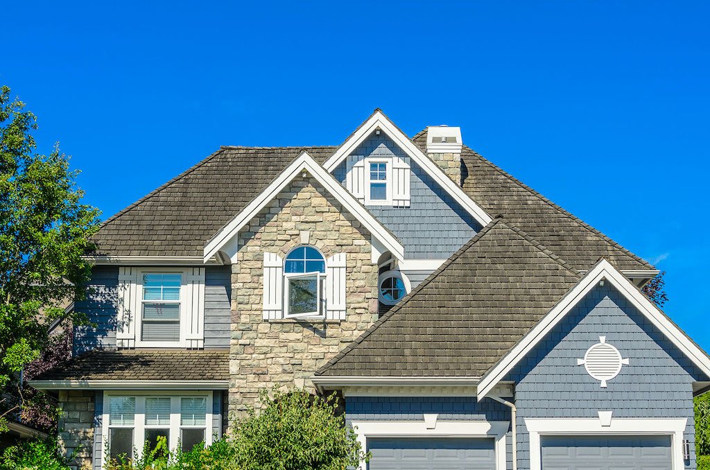 House with architectural asphalt composition shingles