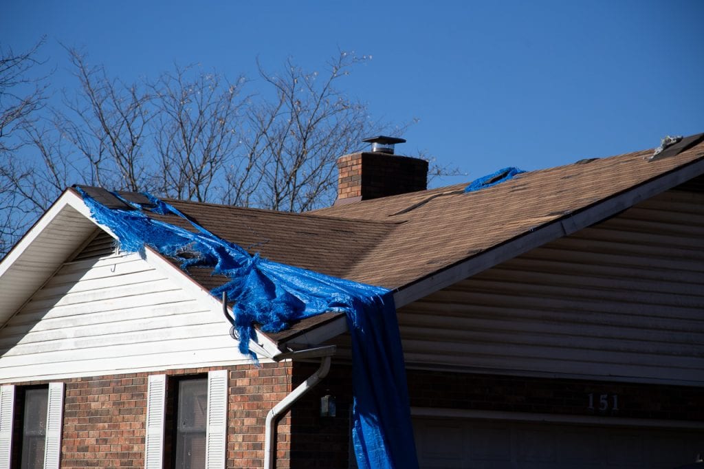 House in hollister with unrepaired storm damage