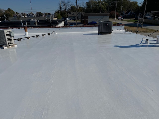 Silicone coating to renew and seal a flat roof in springfield mo