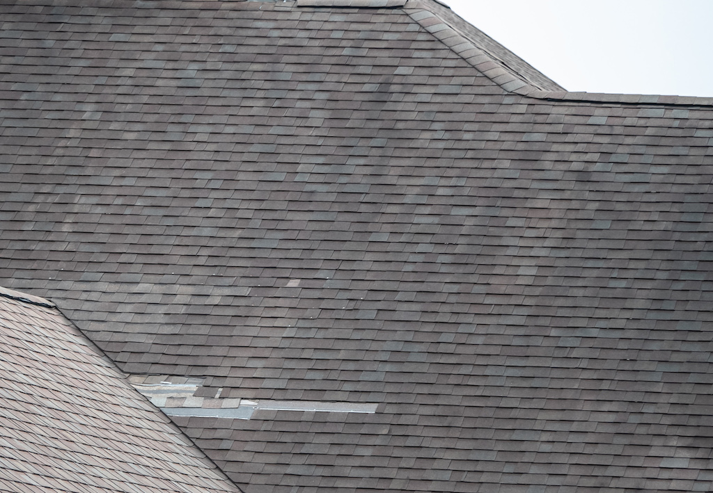 Shingle Roof Types, Installation, And Repair 4 Shingle roof with poor repair in branson mo. Missing shingles, shingle patch, missing ridge cap, and visible nails face-nailed into shingles