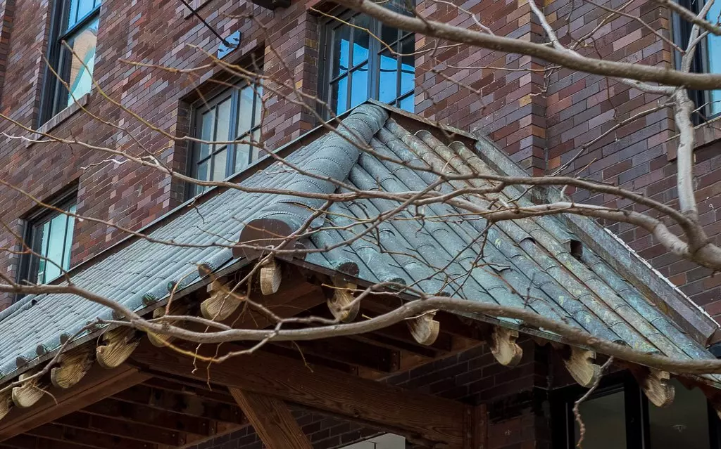 Branson Metal Roofing Installation And Repair 13 Copper tiles on a roof in downtown springfield, mo