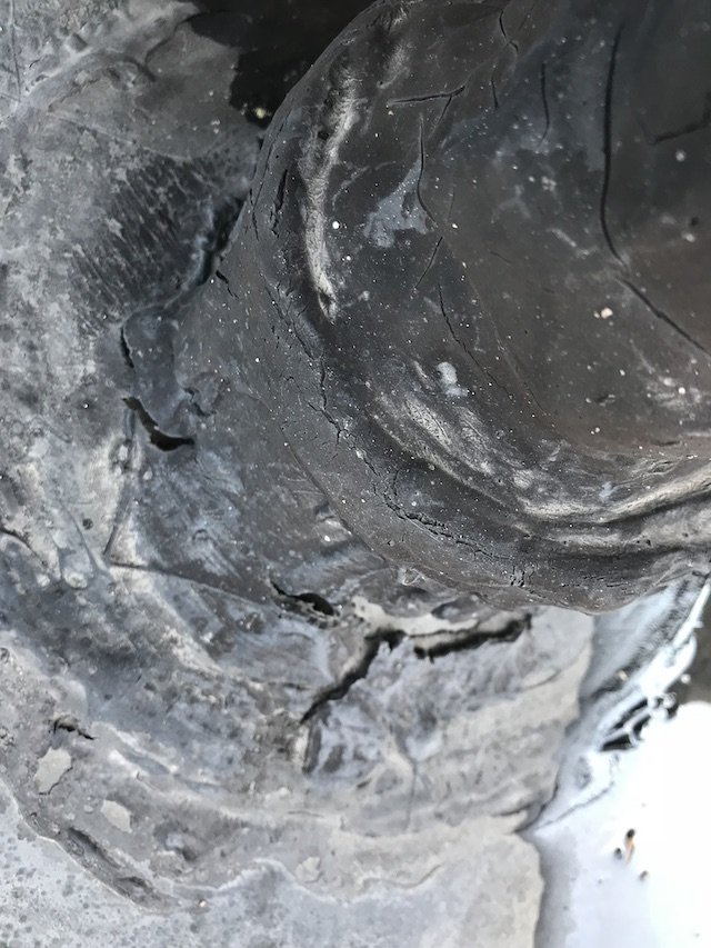 Cracked pipe boot causing leak