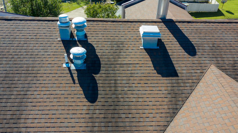 Shingle Roof Types, Installation, And Repair 3 Mail damage on commercial roof hotel in branson mo
