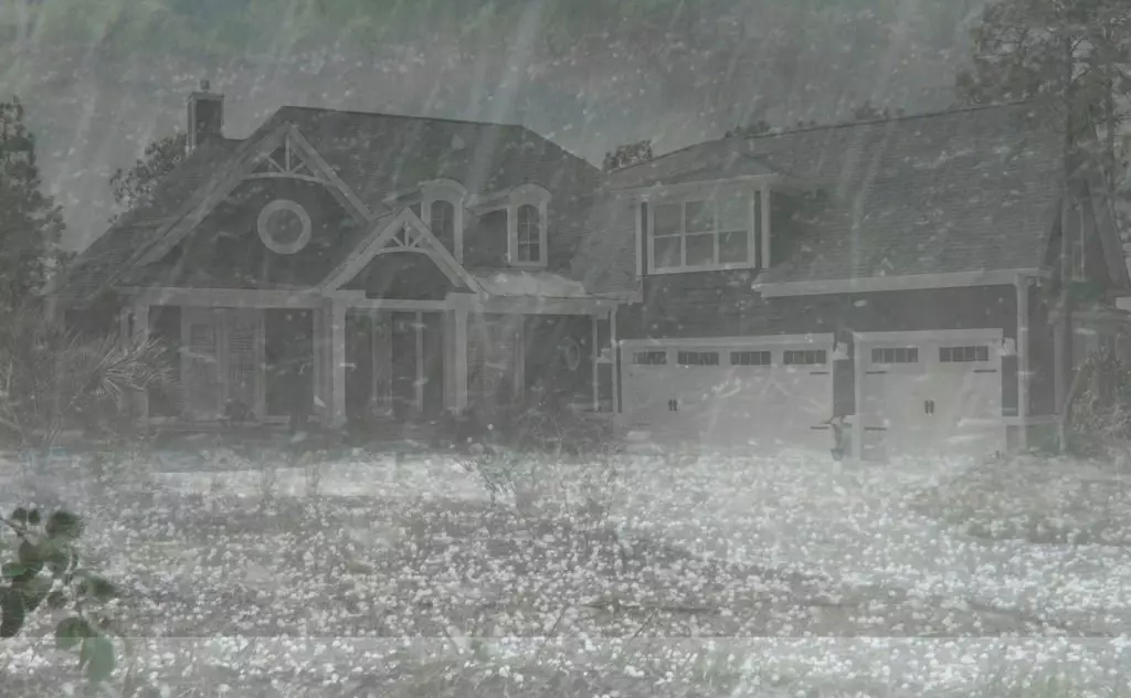Harrison Ar Roofing Company 2 House with hail storm
