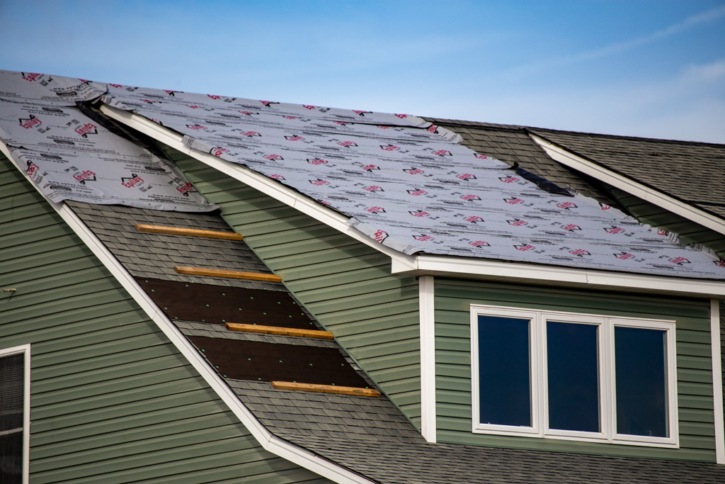 Temporary roofing repairs waiting for insurance